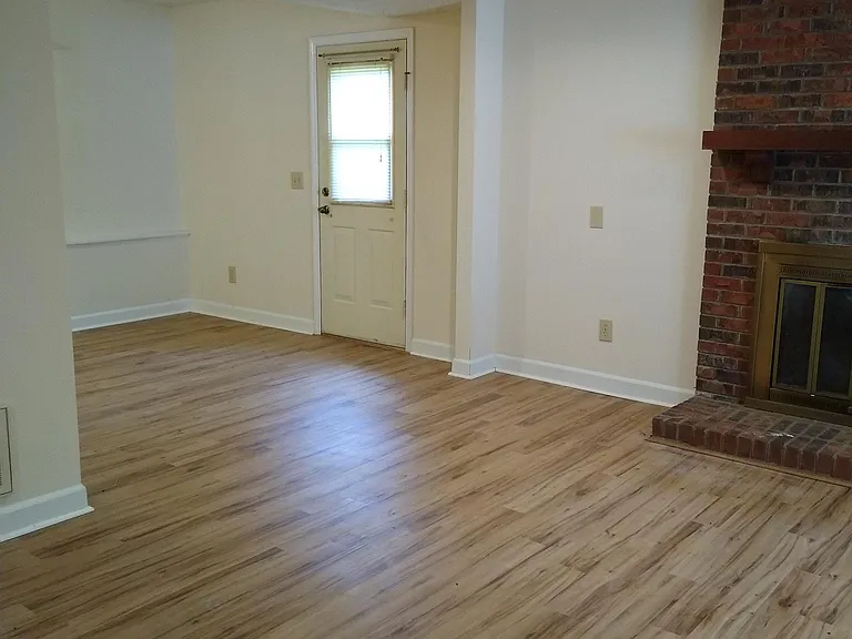 downstairs (lower level) family room--laundry room and half bath (off to the left)
