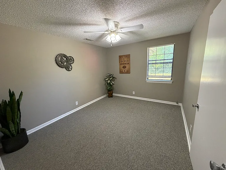 BR overlooks private wooded back yard