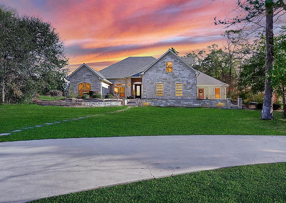 This modern Hill Country home has everything and more...you have to see this one.