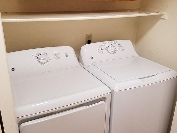 Brand new washer/dryer in laundry closet
