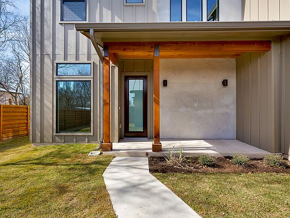 Stained wood posts / Stucco