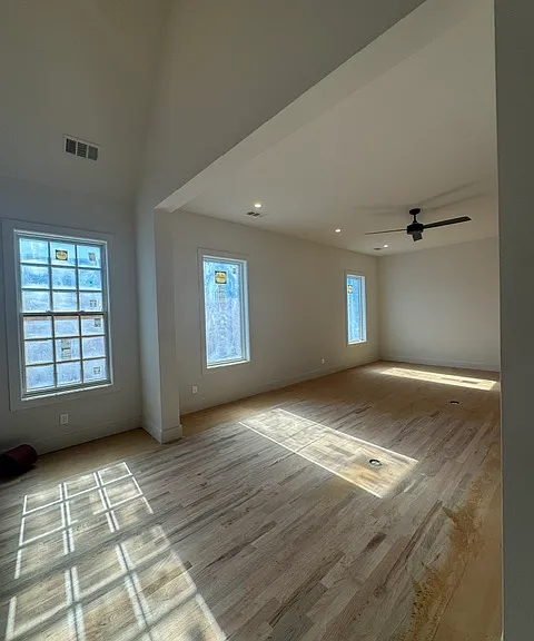 Living room into first open Dining area