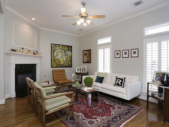 Highlighted by beautiful crown molding, stunning gas log fireplace, and ample natural light, the spa