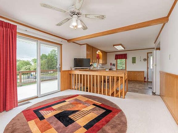 Kitchen and Dining Area with patio door to the large deck