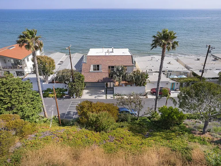 Breathtaking beachfront vacation home with convenient beach access for your enjoyment.