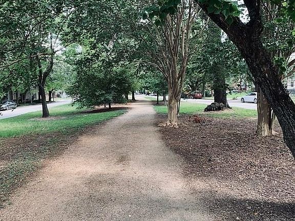 A National Geographic article boasts "stroll the area's broad, tree-canopied esplanades and side streets dotted with homes dating from the early 1900s and you may think you've landed in a small town."