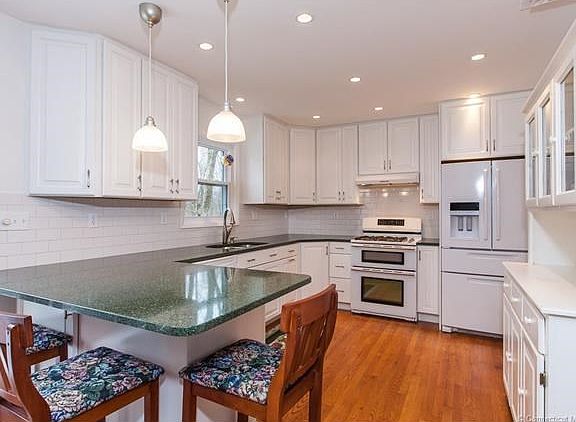 Gas double oven, silastone counter tops, dishwasher and refrigerator 2 years old.