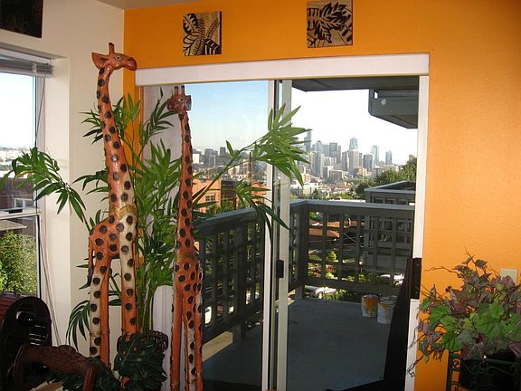 Balcony opening to the lakes+Mountains+Downtown view