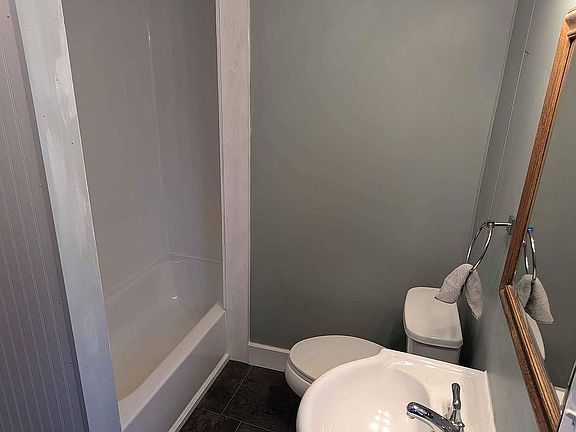 Full bath - storage behind