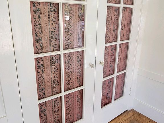 Old murphy bed turned into closet, storage space