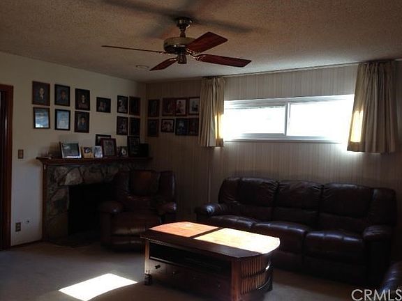 FAMILY ROOM WITH STONE FIREPLACE
