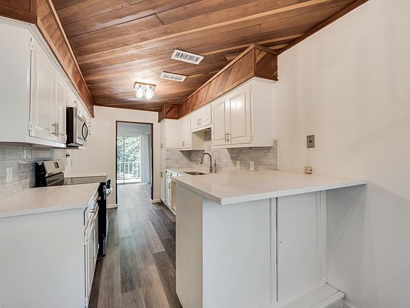 2nd image of 5814 Meadow Wood Ln #5814