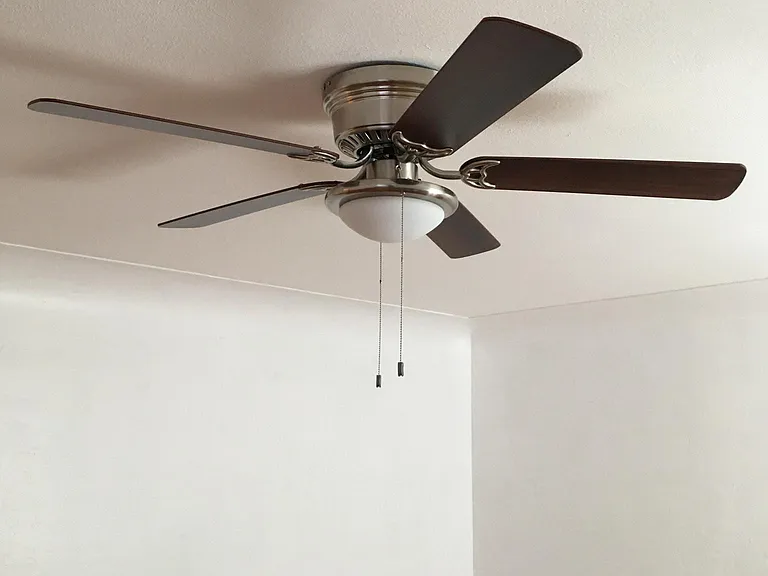 Ceiling fans and large windows take advantage of perfect weather days. Also central heat/air for the not so perfect weather days.