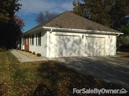 Garage Side
						:
						Looking northeast, Motion light, Large driveway for plenty of guests
