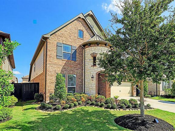Mature landscaping makes yard work an easy chore.