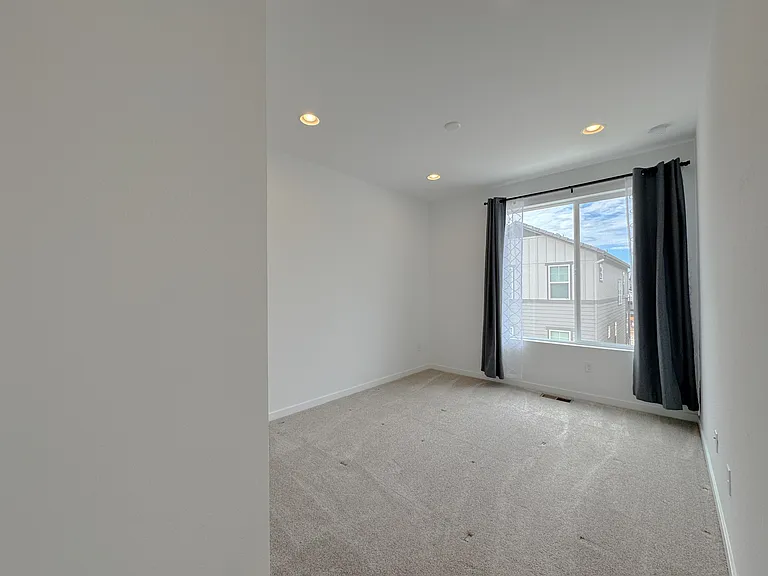 Bright and spacious second bedroom with great closet space.