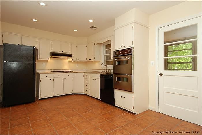 Renovated Kitchen with New Black Appliances