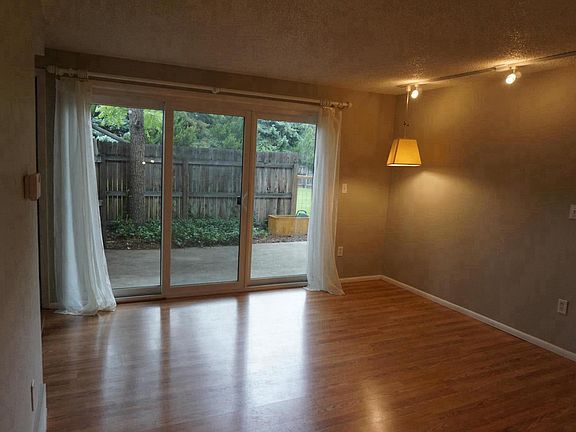 Living room w sliding doors to private deck
