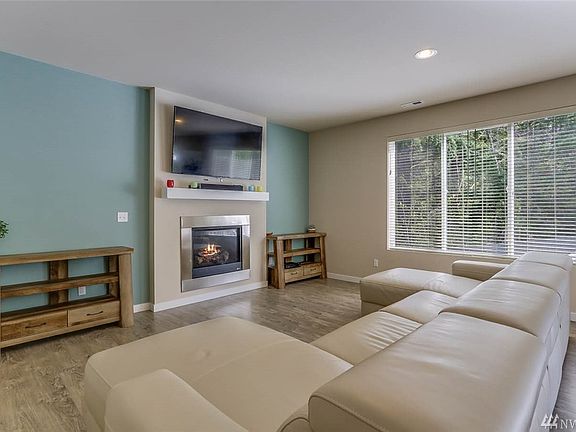 Watch your favorite programs in the living room, large enough for this sectional and more! 