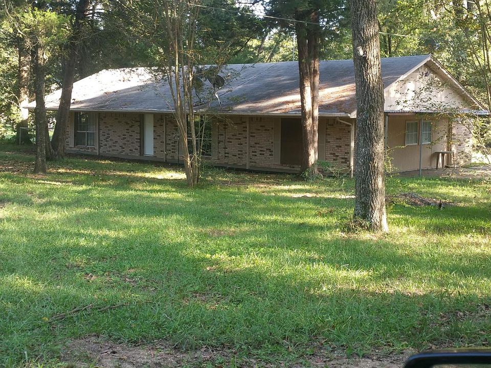 3/2/2 carport. MISD. Tree-shaded, solid brick home with covered front porch on approximately 1/2 acre--not in a subdivision! Tile, wood laminate & carpet. Unrestricted!