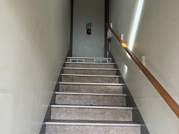 Stairway to unit. Unit Entrance to the right upstairs