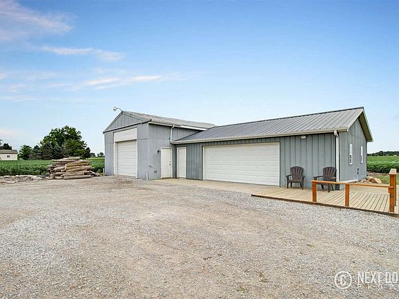 2 attached pole barns each measure 24x32