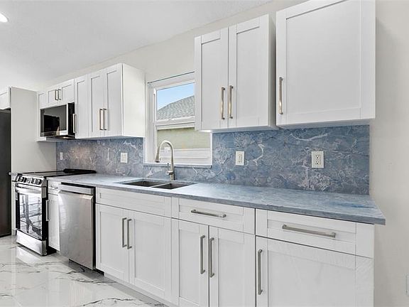 4th image of 11708 CARROLLWOOD COVE DRIVE