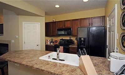 4th image of 9042 E 24th Pl Unit 104