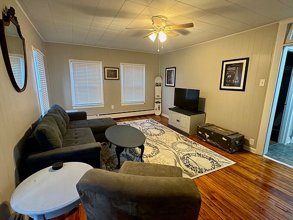 Large Living Room, Couch, Desk, and TV
