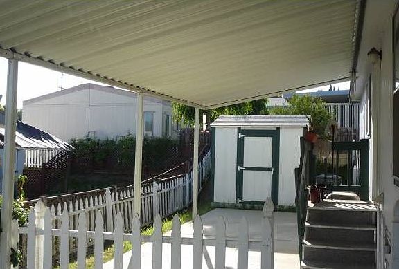 car port, big shed, fence