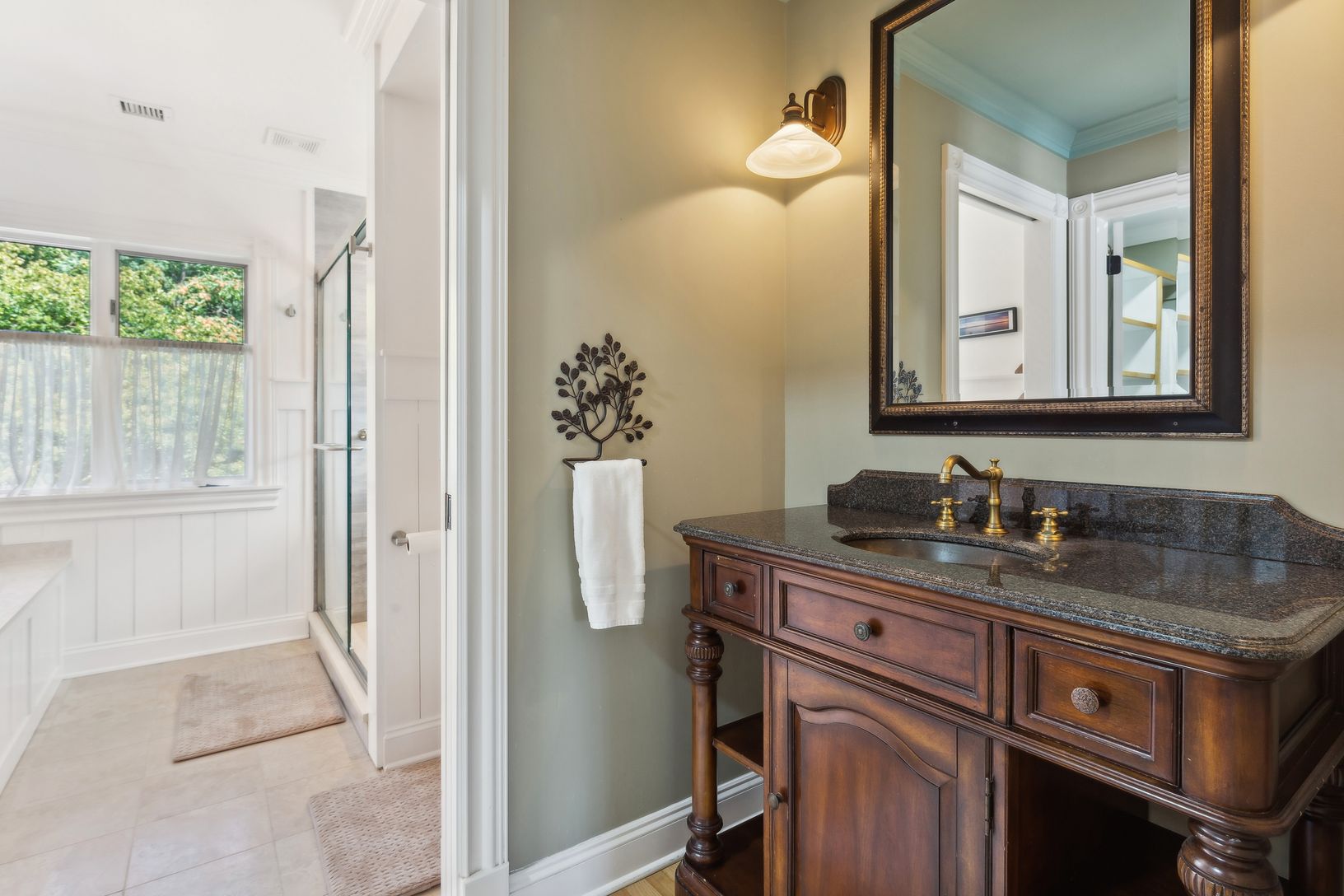  Primary Bathroom Entry. The Sink Resides Outside the Bathing Area
