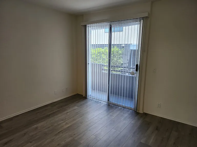 Second bedroom, wrap-around balcony.