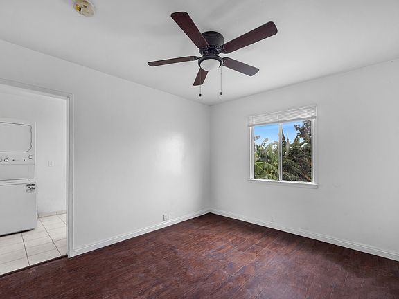 Living room and entrance to kitchen