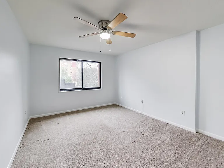 7611 Maple Ave #202 — Photo 16
