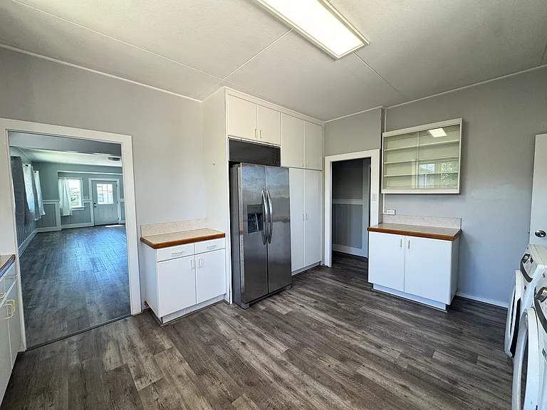 Kitchen with High Efficiency Washer/Dryer, Dishwasher, Microwave, Refrigerator, Stove/Oven, and Disposal!