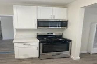 Kitchen - Stove and microwave