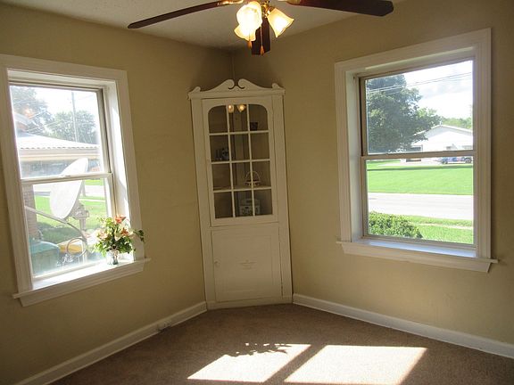 Dining room is separate and has a built in cabinet.