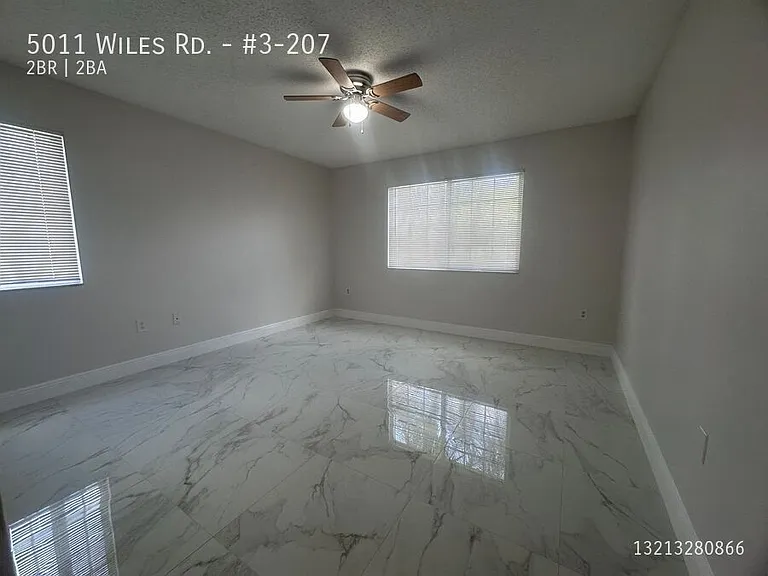 5011 Wiles Rd #3-207 — Photo 17