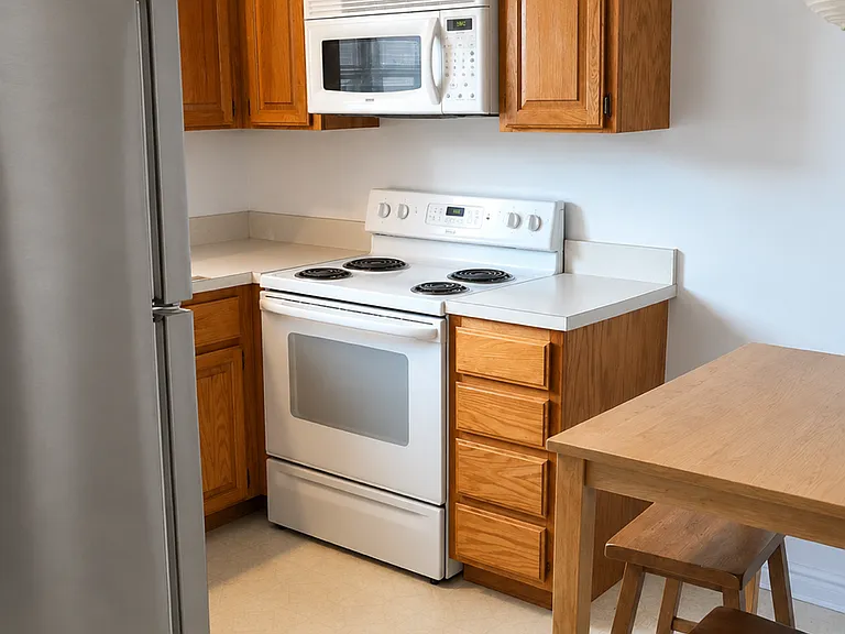 Kitchen provides ample storage and room for a small table