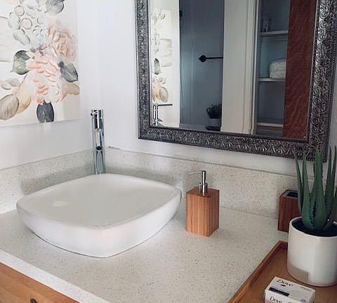 Beautiful sink feature and big mirror