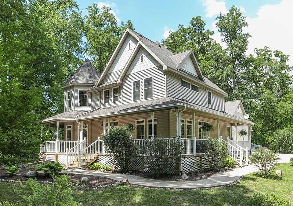 Custom Victorian home on 10+ acres of beautifully forested private property.