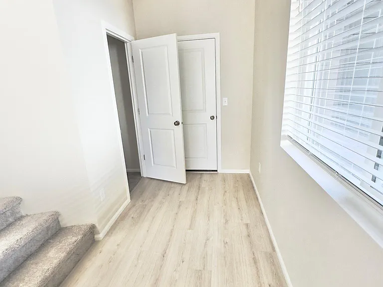 door to garage and understair closet