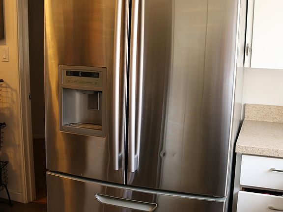 French Door Refrigerator with built in Water Dispenser