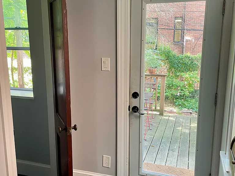 first floor half bath and backyard access