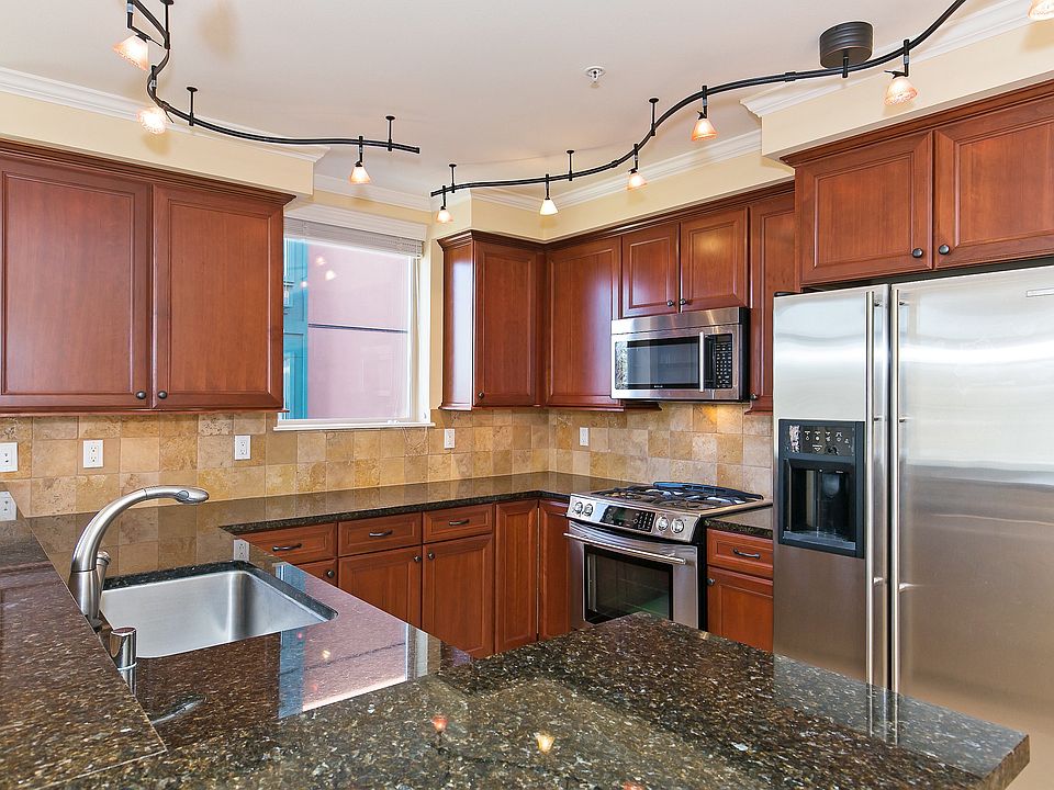 Beautiful cherry cabinets, granite counters, stainless appli