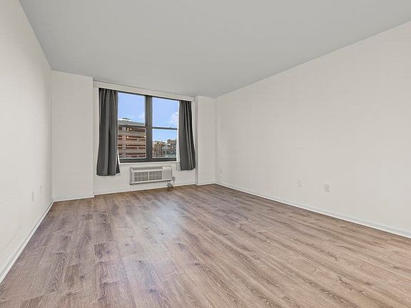 5th image of 102 Christopher Columbus Dr APT 303