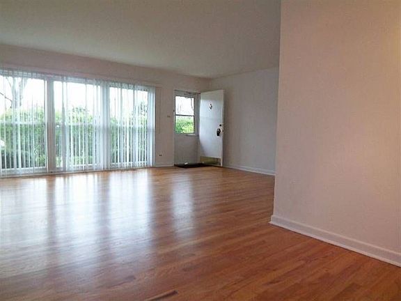 Living Room and front door as viewed from Dining Room