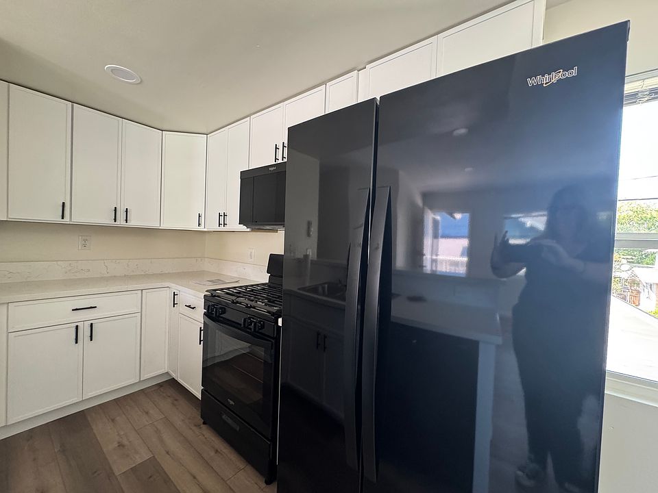 Lots of cupboards, microwave stove refrigerator
