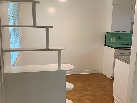 Kitchen nook, energy efficient window on left, ceiling fan