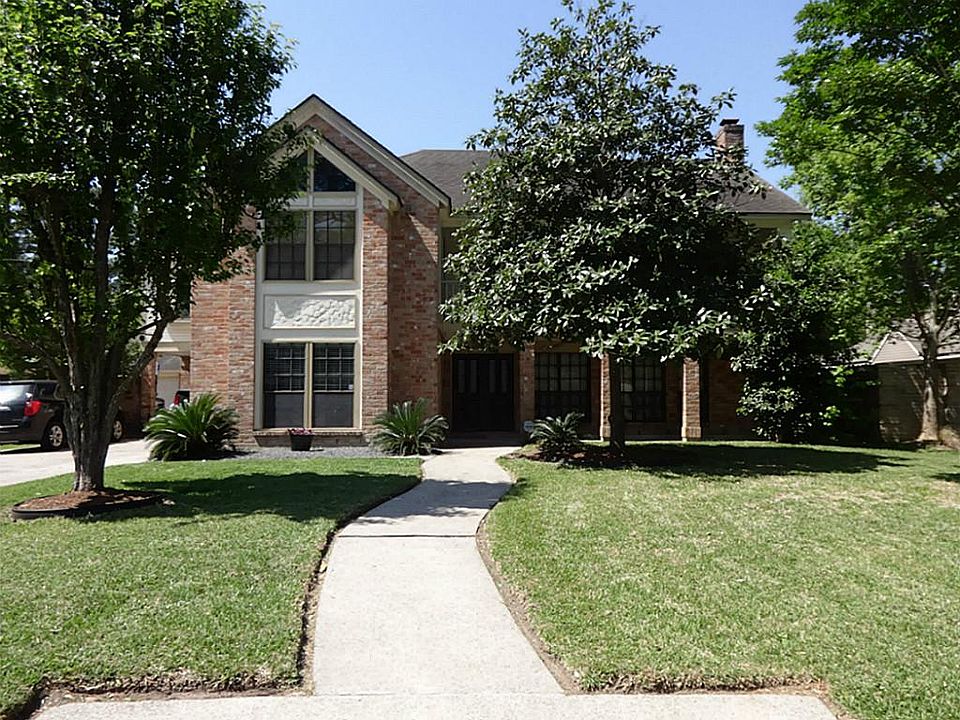 In prestigious, heavily wooded Woodcreek subdivision.